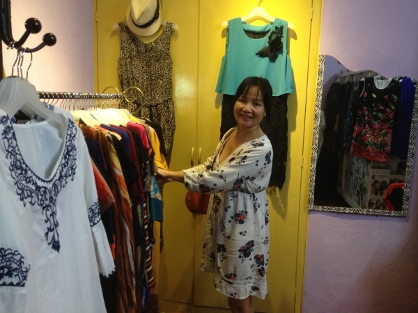 Nga Beertsen choosing clothes to be used as examples from JS Ritz boutique in Bayan Baru, Penang for her upcoming workshop