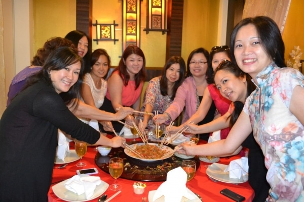 Tossing "yee sang" for another abundant year for WomenBizSENSE